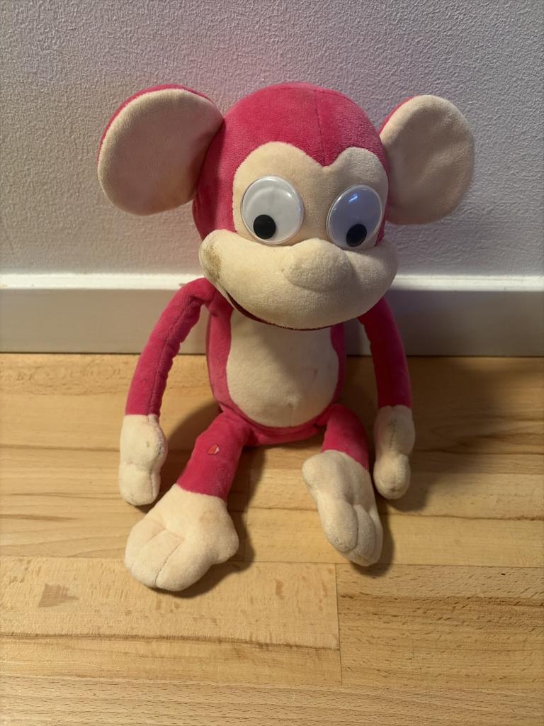 Lyserød abe bamse