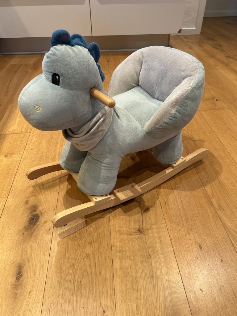 Blå dinosaur gyngehest